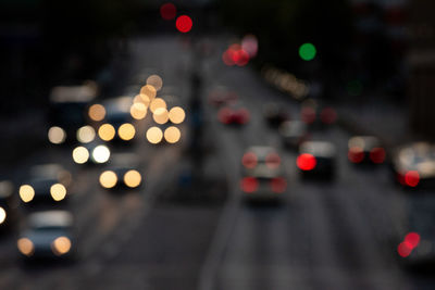 Defocused image of illuminated city street