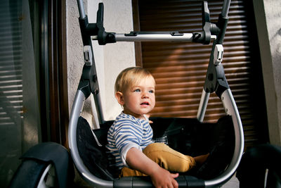 Portrait of cute boy looking away