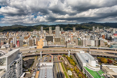 High angle view of street amidst buildings in city