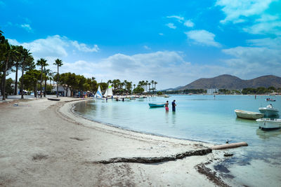 Boats moored in sea