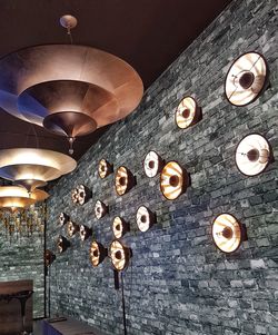 Low angle view of illuminated lanterns hanging on ceiling