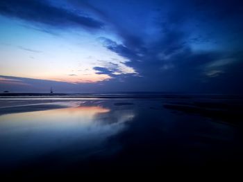 Scenic view of sea against sky at sunset