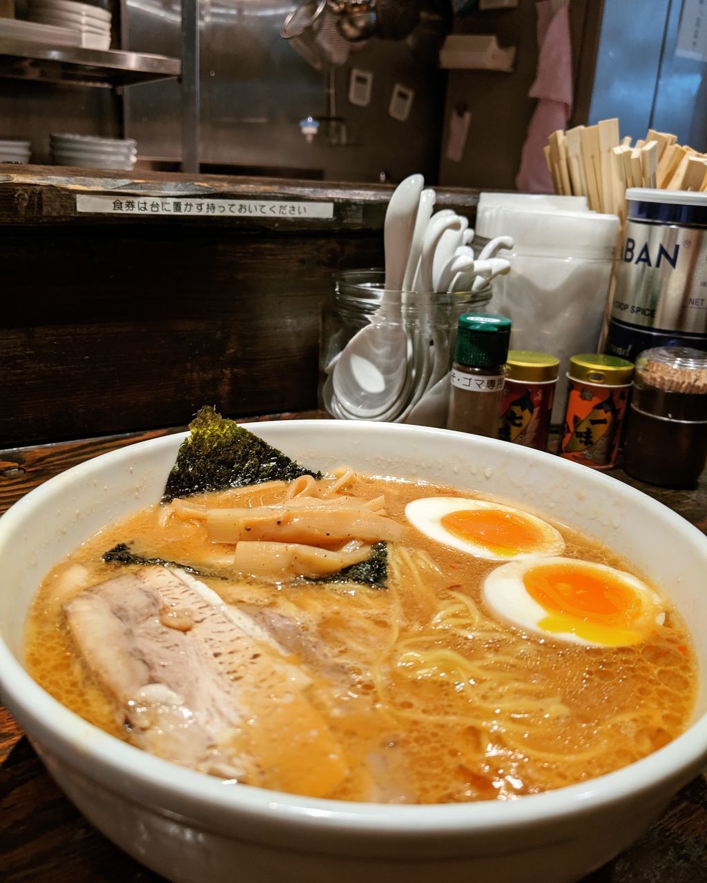 CLOSE-UP OF SOUP IN BOWL ON TRAY