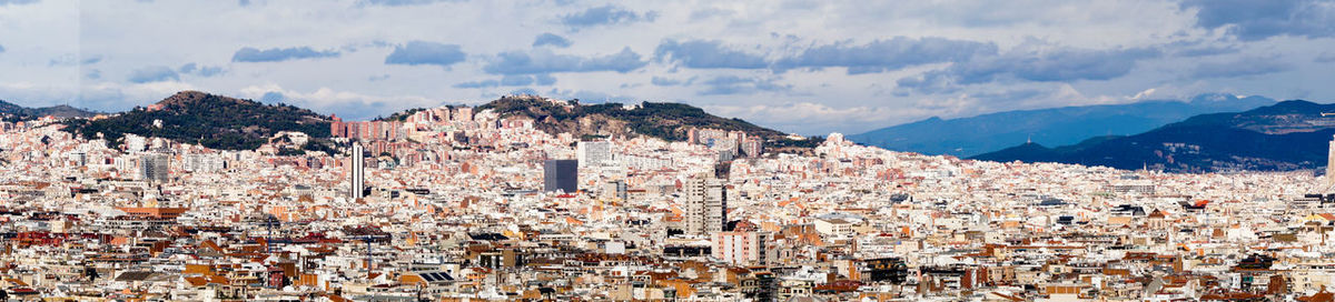 Panoramic shot of townscape against sky, barcelona 