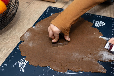 Low section of person preparing food on table