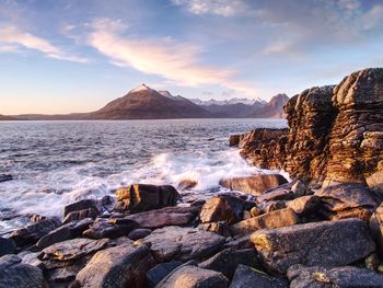 The famous rocky bay of elgol on the isle of skye, scotland. the cuillins mountain in the background