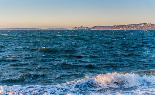 A seattle ferry navigates windy seas.