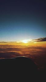 Scenic view of landscape against sky during sunset