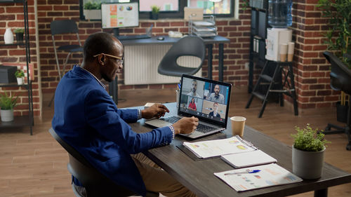 Businessman doing video call at office