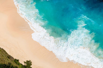 Beautiful landscape of a broken beach, the southeast island of bali, indonesia.