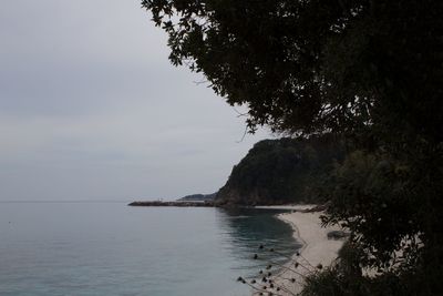 Scenic view of sea and cliff