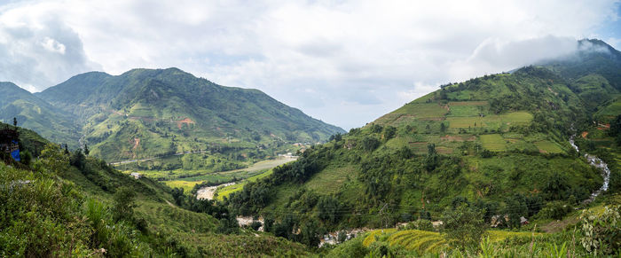 Panoramic view of landscape and mountains against sky