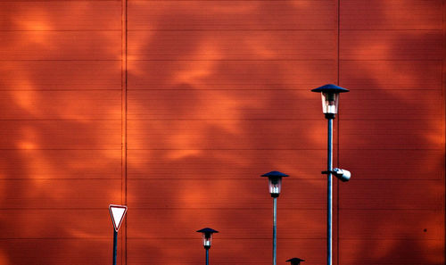 Lamp post against building