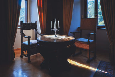 Empty chairs and table at home