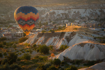 View of hot air balloon over landscape