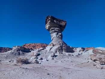 Low angle view of rock formations against sky, valley of the moon
