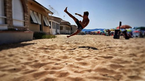 Man jumping on beach