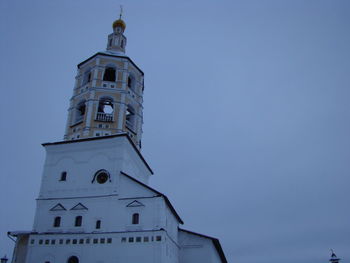 Low angle view of clock tower against sky