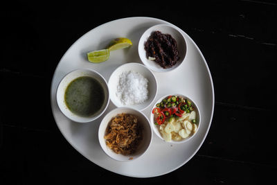 High angle view of breakfast served on table