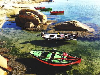 High angle view of boats moored at beach