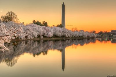 Scenic view of lake at sunset