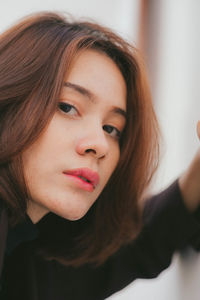 Close-up portrait of a beautiful young woman
