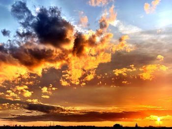 Low angle view of dramatic sky during sunset