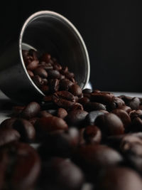 Close-up of coffee beans on table