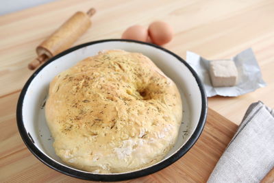 High angle view of bread in bowl on table