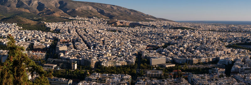 Aerial view of townscape against sky