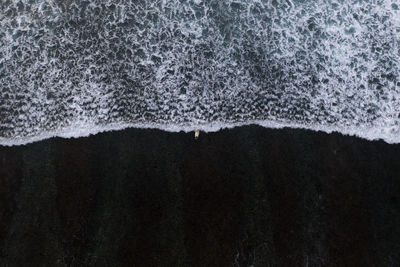 Scenic view of sea against mountains