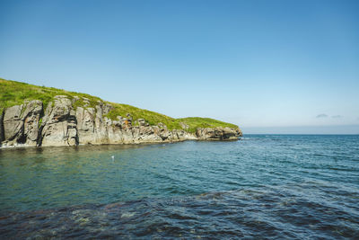Summer colorful landscape of green hills and blue clear beautiful sea of japan