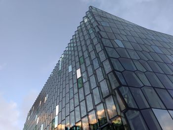 Low angle view of modern building against sky