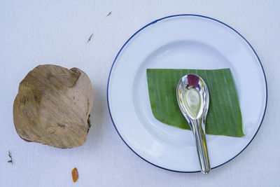 High angle view of bread in plate on table