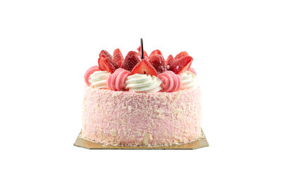 Close-up of cake against white background