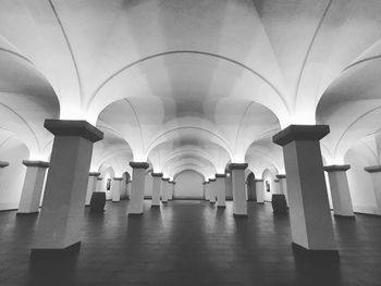 Empty cellar of building with pillars