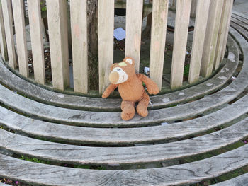 High angle view of stuffed toy on wood