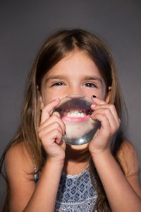 Portrait of a girl holding ice cream