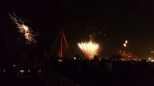 Firework display at night