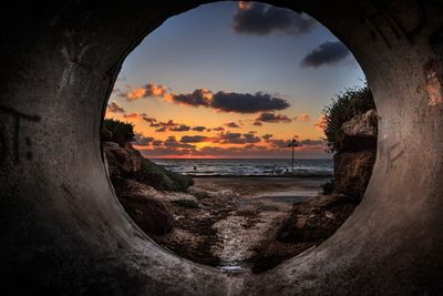 Scenic view of sea at sunset