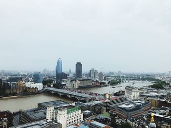 High angle view of buildings in city against sky