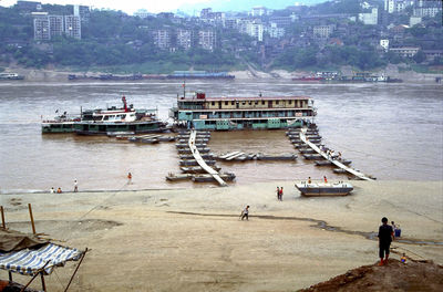 High angle view of people on boat in sea