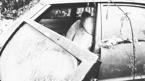 Close-up of broken glass of car