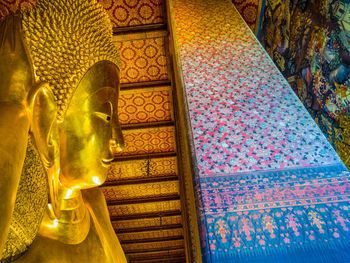 Low angle view of buddha statue in building