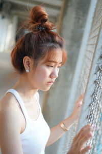 Portrait of woman looking at camera