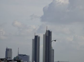 Low angle view of modern buildings against sky