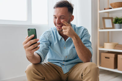 Young woman using mobile phone