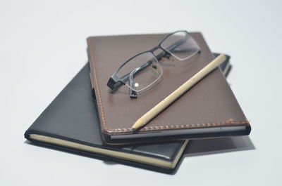 High angle view of pen on table against white background