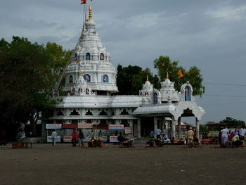 View of temple against cloudy sky