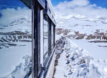 Snow covered mountain against sky